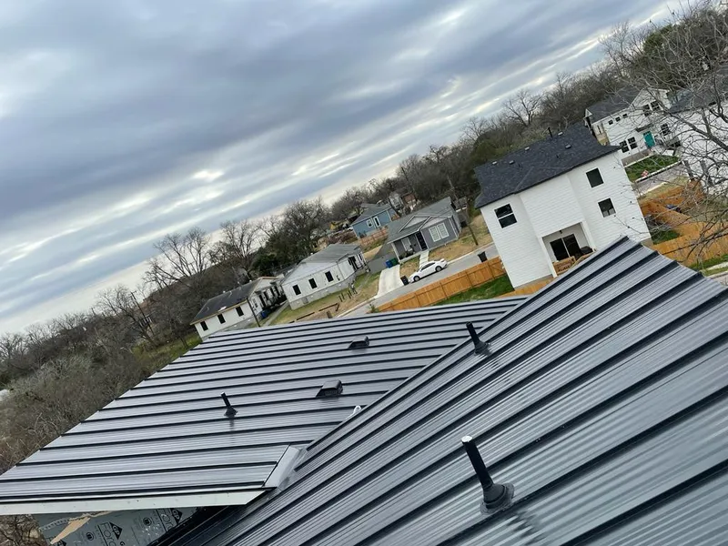 Standing seam metal roof panels with vents for Skylight Repair in Hillside
